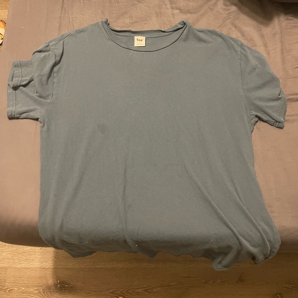 TNA dark blue t shirt, small stain on front